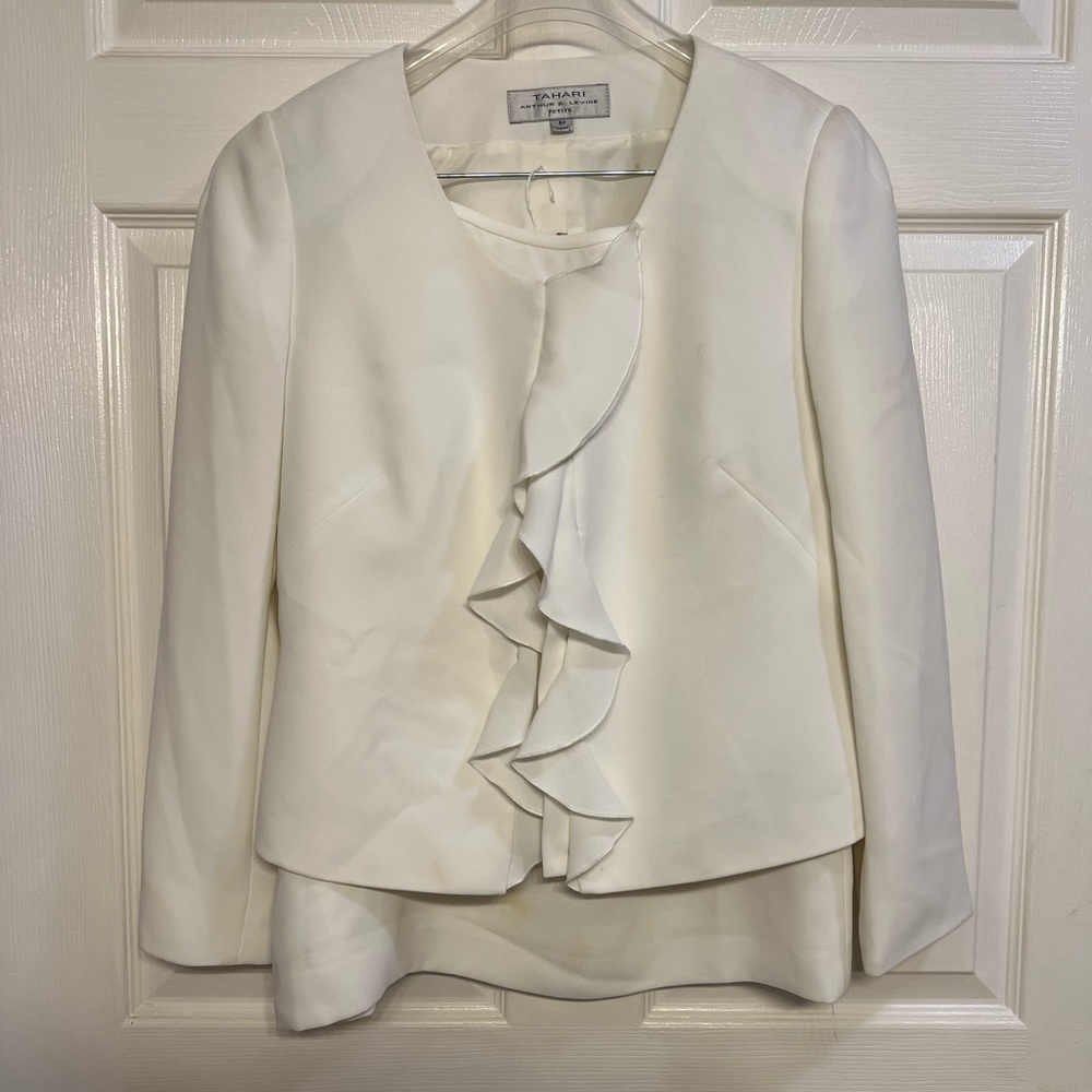 White skirt and jacket with ruffle accent
